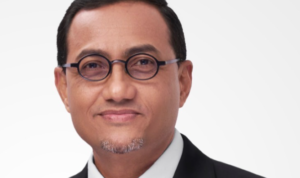 profil-hasan-fawzi-pejabat-ojk-pasar-modal-pengganti-inarno-djajadi_299163